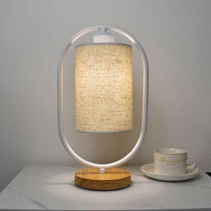 Lumio stoffen tafellamp met houten details