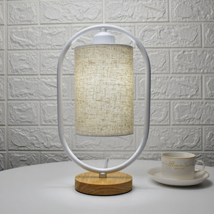 Lumio stoffen tafellamp met houten details