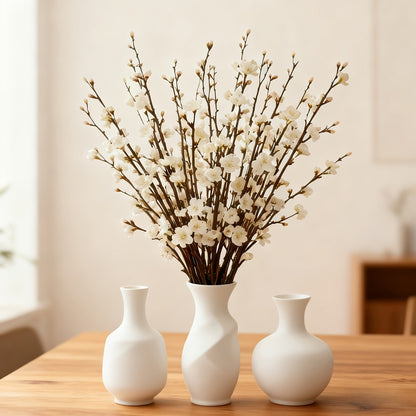 Kunstmatige pruimenbloesems witte kunstbloemen