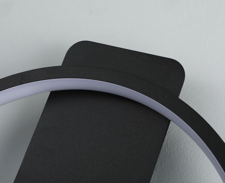 Lumio moderne wandlamp met klok design