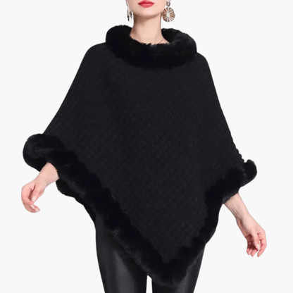 Dames trui poncho met neppels trim