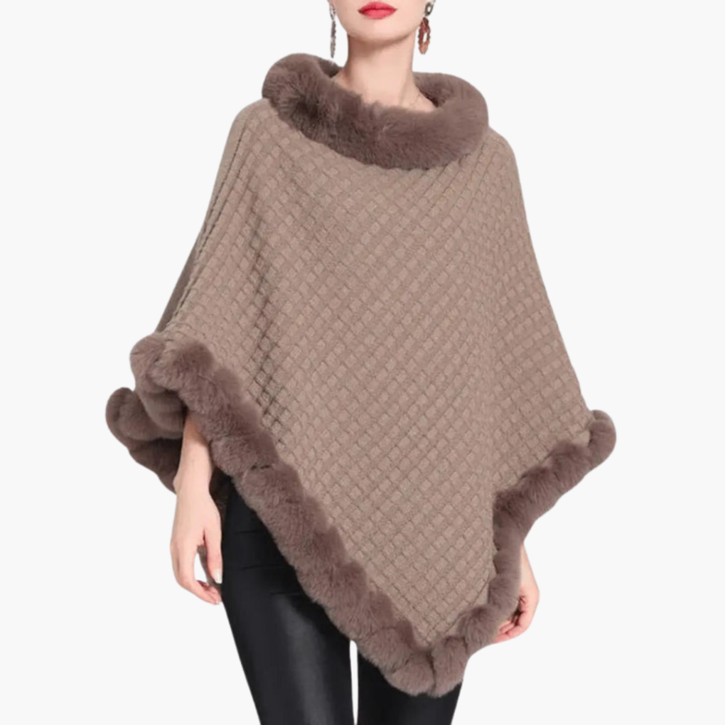 Dames trui poncho met neppels trim