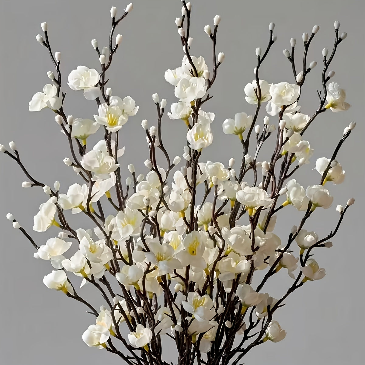 Kunstmatige pruimenbloesems witte kunstbloemen