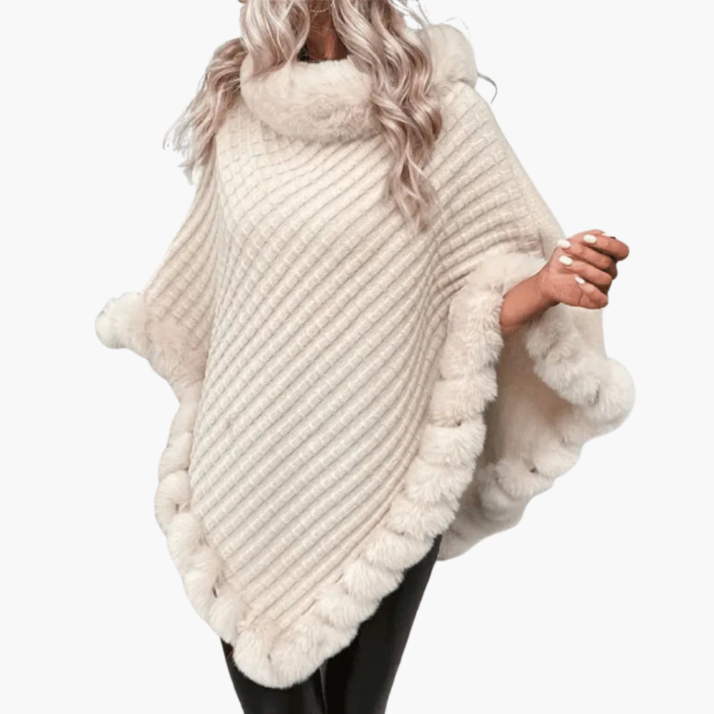 Dames trui poncho met neppels trim