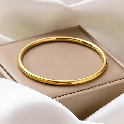 Minimalistische hoogglanzende ronde armband