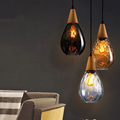 Moderne glazen hanglamp met houten accent