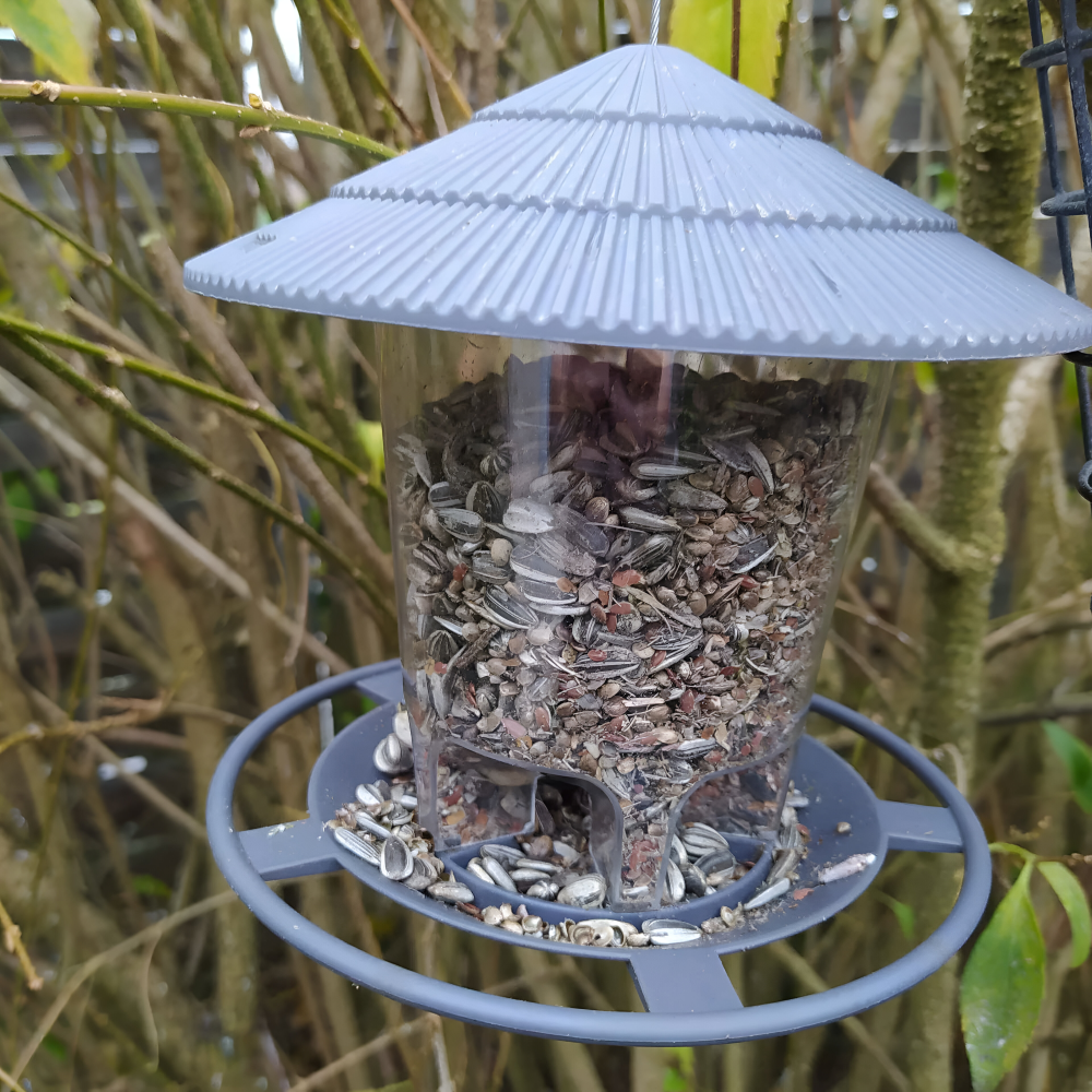 Automatische zeshoekige vogelvoederbak