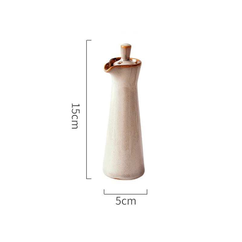 Keramische olie- en azijnfles met run-glaze afwerking