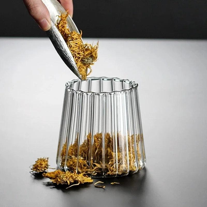 Glazen opbergpot met houten deksel