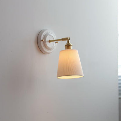 Keramische wandlamp met messing afwerking