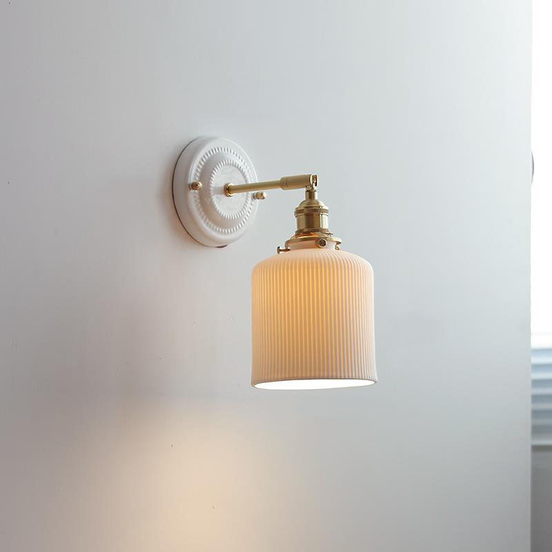 Keramische wandlamp met messing afwerking