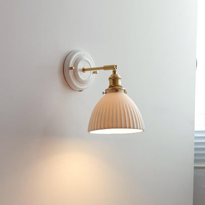 Keramische wandlamp met messing afwerking
