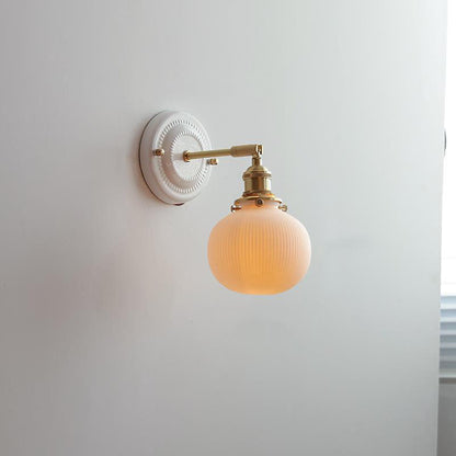 Keramische wandlamp met messing afwerking
