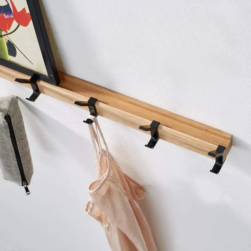 Wandkapstok met beweegbare dubbele haken