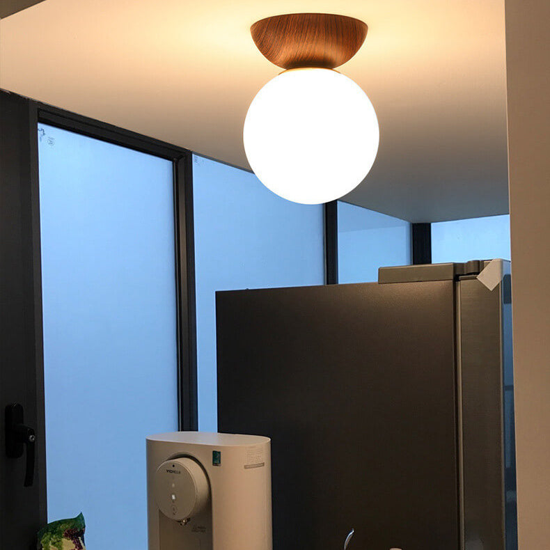 Glazen bol plafondlamp met houtnerf