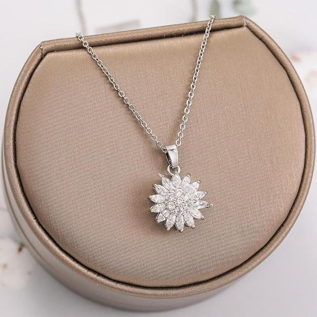 EleganteEssentie draaiende zonnebloem ketting