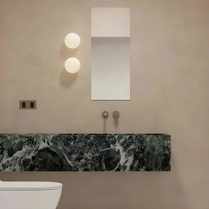 Odior wandlamp met matglazen bol