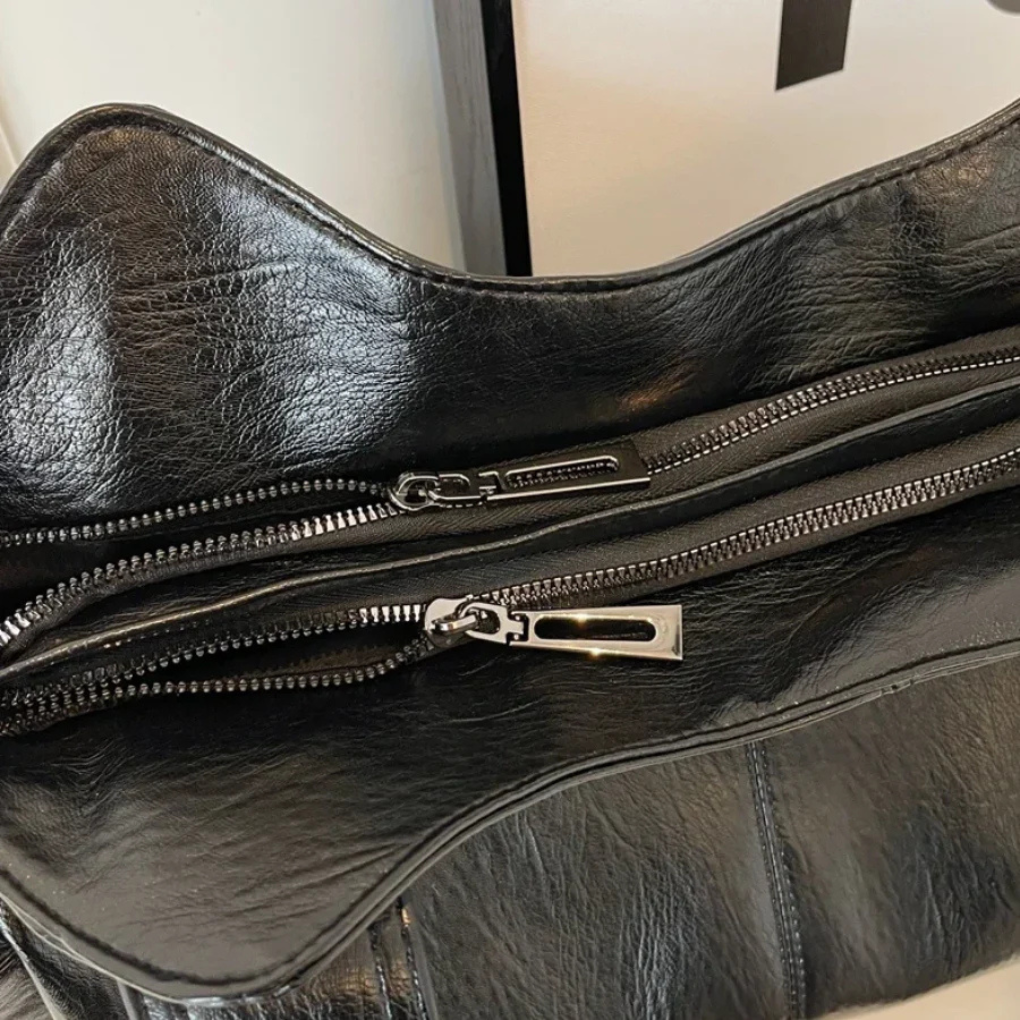 Dames schoudertas met verstelbare riem