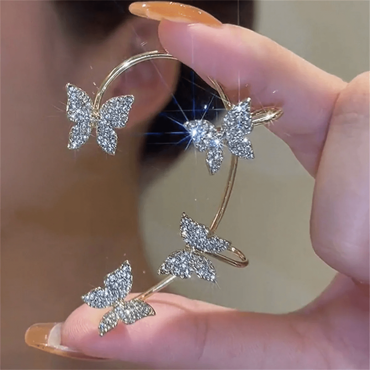 FlutterGleam vlinder clip-on oorbellen